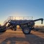 A Flexi-Coil 60 Series Aircart with the sun behind it on the Lynch family farm in WA